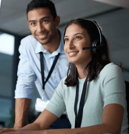 Man and woman looking at computer screen 